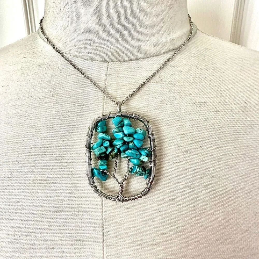 Avon tree faux turquoise silver tone pendant necklace